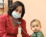 Pediatric healthcare provider and patient