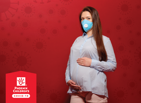 pregnant with a mask on