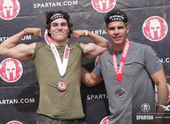 Alex his dad John participating in the 2022 Spartan Race