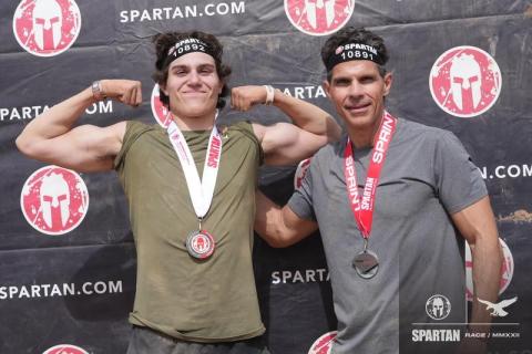 Alex and his dad, John participating in the 2022 Spartan Race