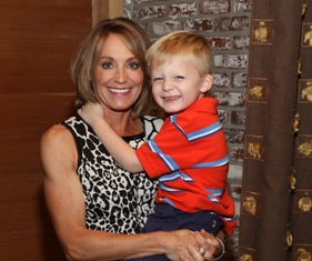 Mother holding young son