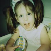 Young girl holding and Easter egg