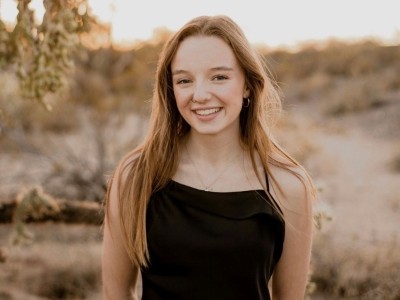 Teen girl posing in desert