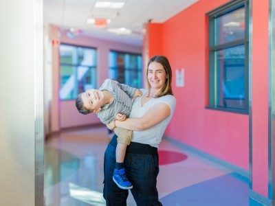 Boy in his mother's arms
