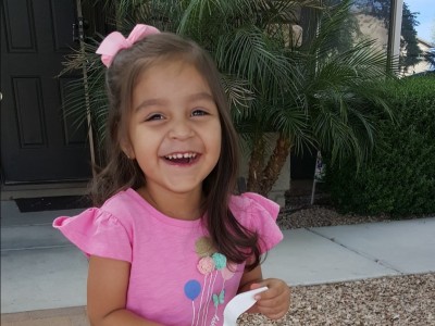 Smiling girl wearing pink