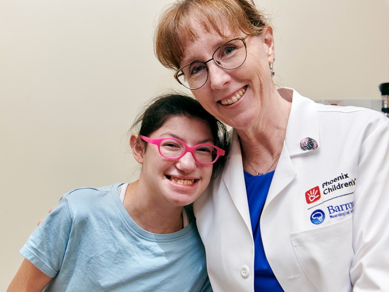 Doctor hugging a patient
