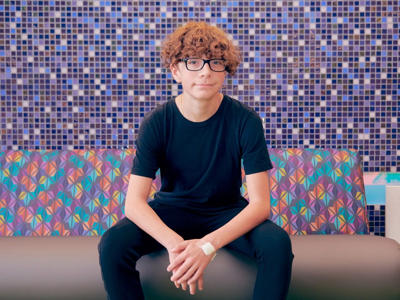 boy sitting on couch