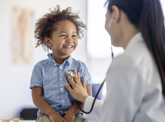 Happy kid at primacy care appointment