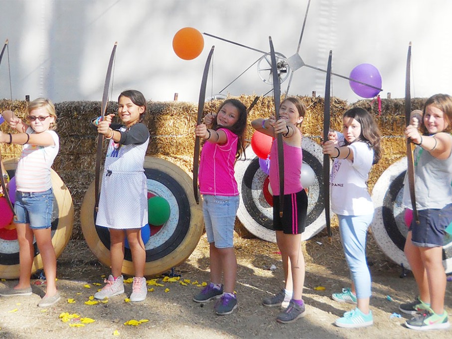 Kids doing archery at Camp Rainbow