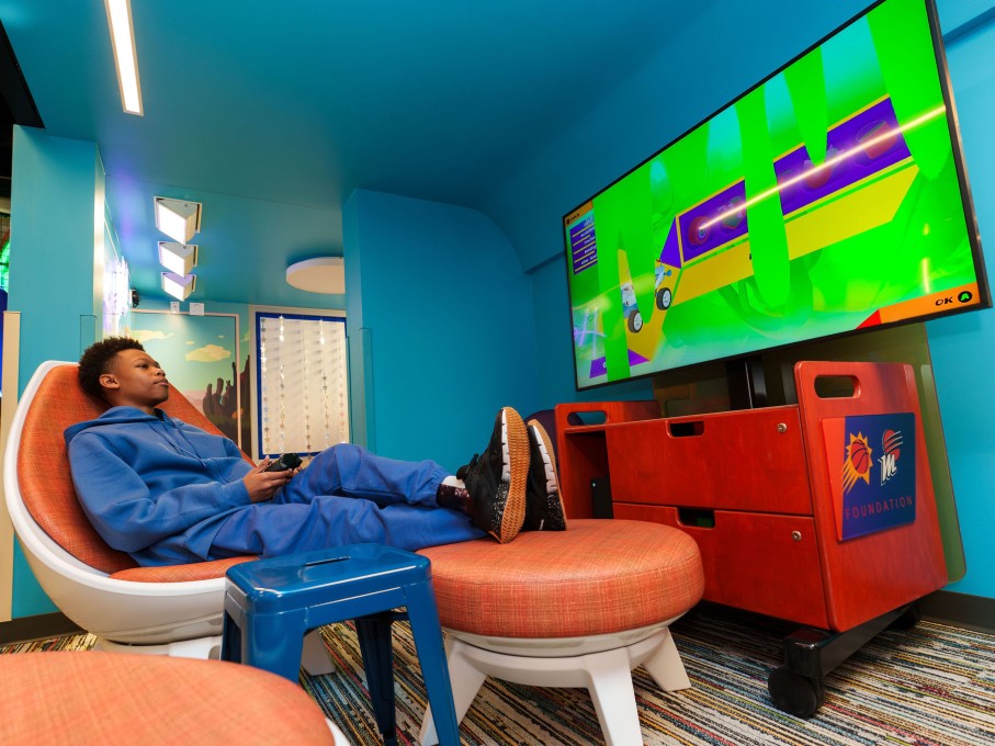 Boy playing video game in The Zone